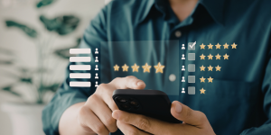 Person using a smartphone with a digital star rating and customer feedback interface overlay