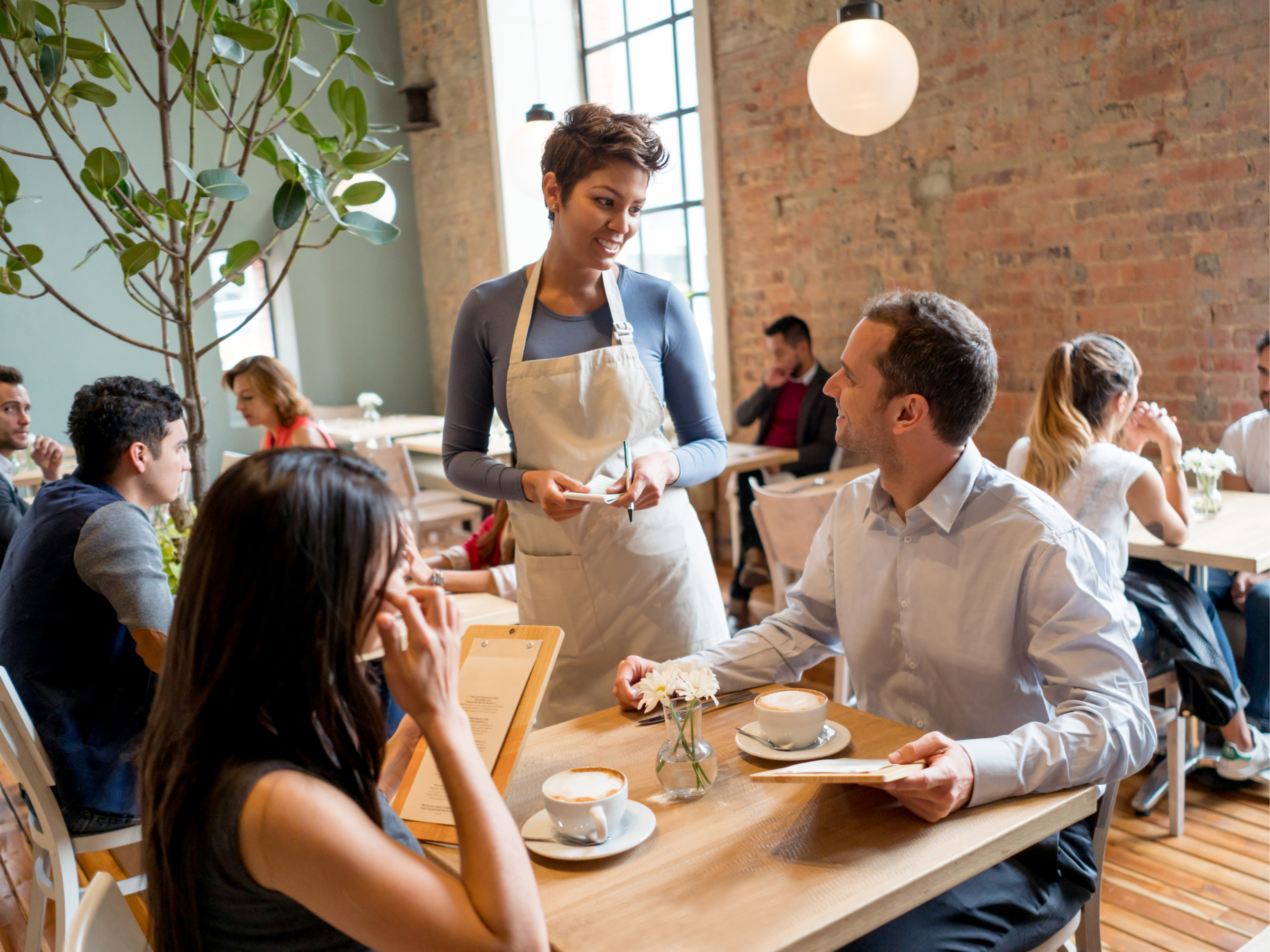 A waitress serving customers