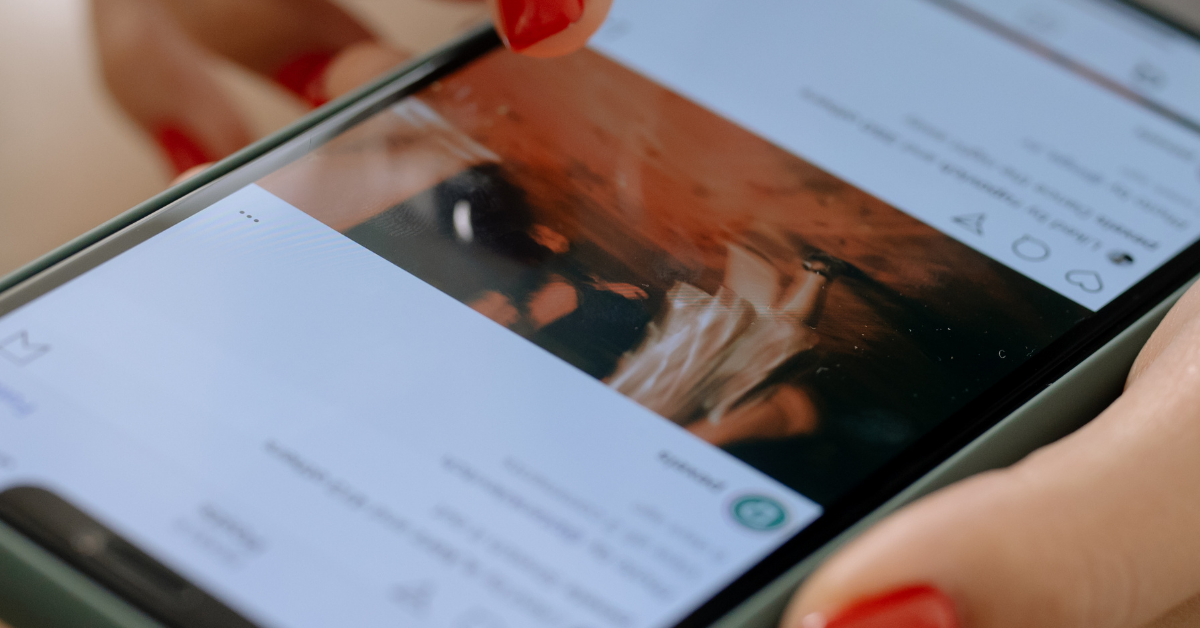 A woman scrolling Instagram