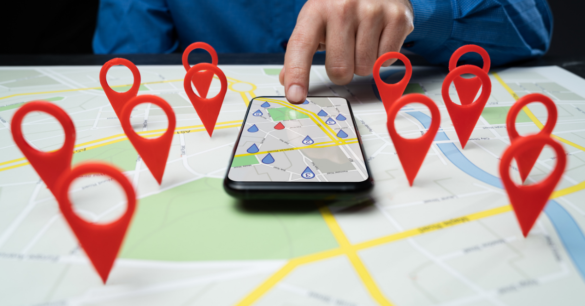 Man looking at a map pinpointing locations
