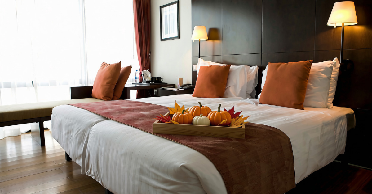 autumnal decor on hotel bed