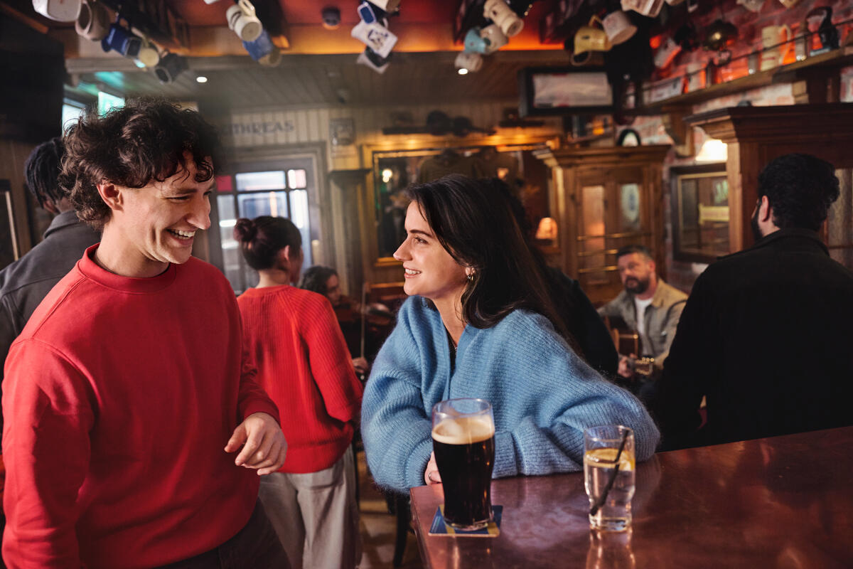 Customers enjoying a drink in a pub