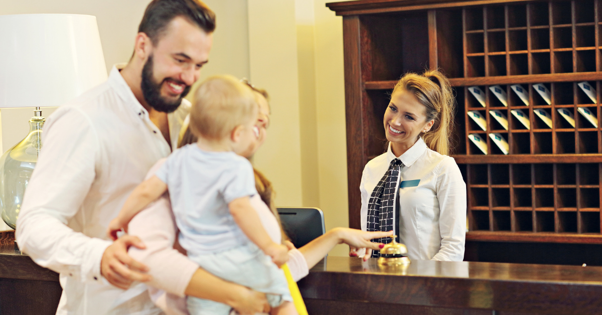 Guests checking in to a hotel